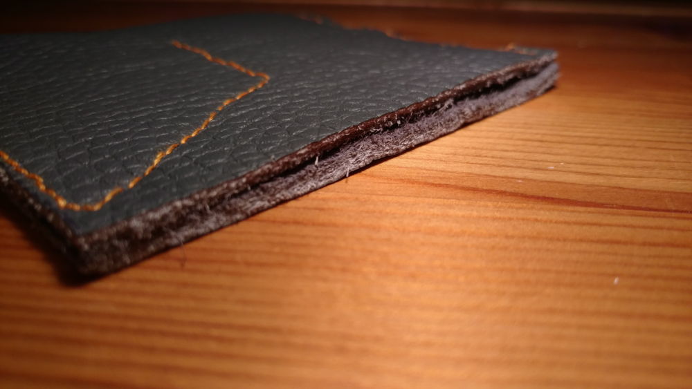 A close up picture of the opening of the finished coin wallet